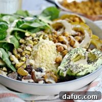 Vibrant Tandoori Roasted Chickpea and Squash Buddha Bowl 11 Tandoori Roasted Chickpea & Squash Buddha Bowl recipe image