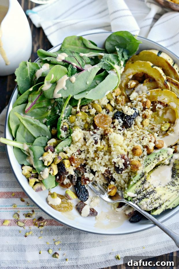 Vibrant Tandoori Roasted Chickpea and Squash Buddha Bowl 7 Overhead view of a ready-to-eat Tandoori Roasted Chickpea & Squash Buddha Bowl
