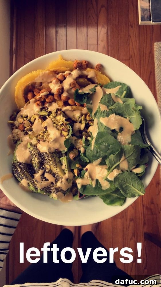 Vibrant Tandoori Roasted Chickpea and Squash Buddha Bowl 8 Tandoori Roasted Chickpea & Squash Buddha Bowl with a fork ready to dig in