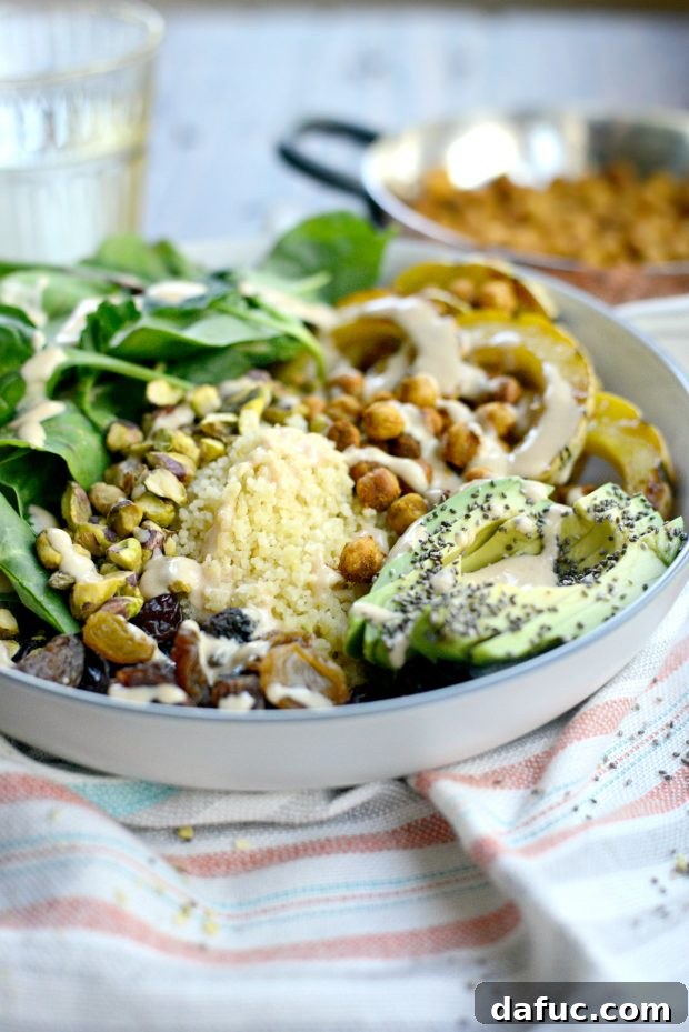 Vibrant Tandoori Roasted Chickpea and Squash Buddha Bowl 10 Tandoori Roasted Chickpea & Squash Buddha Bowl ready to be served