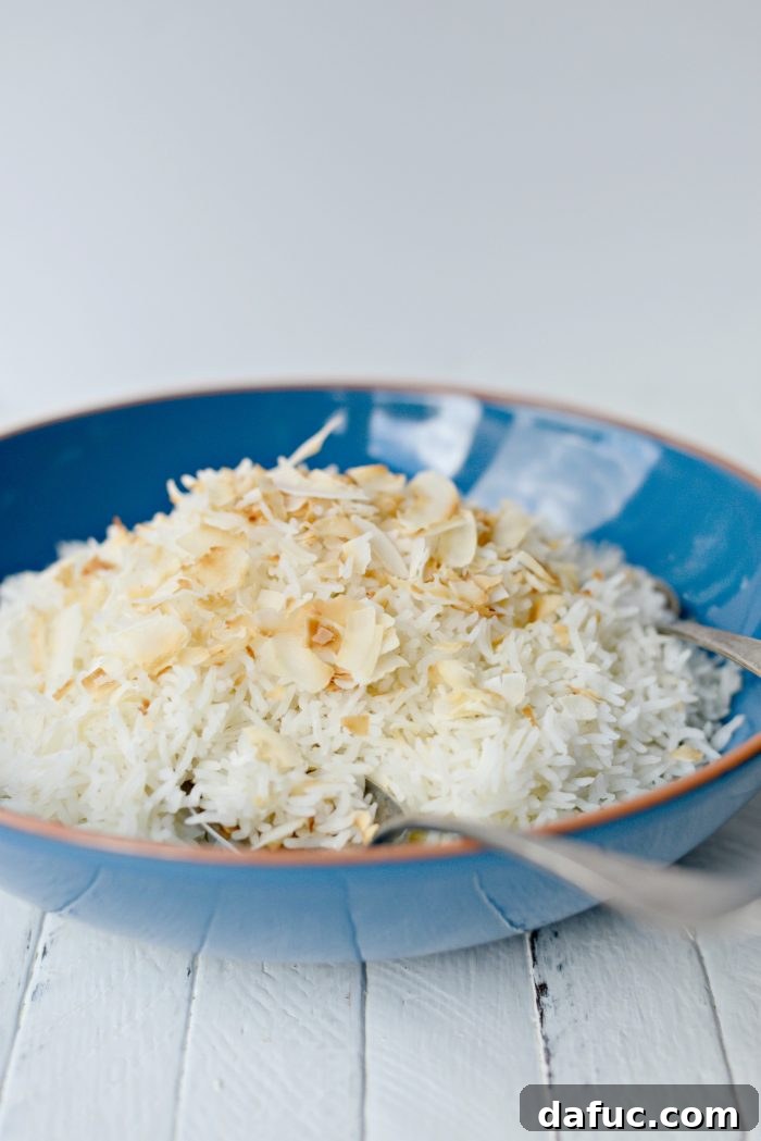 Effortless Rice Cooker Coconut Rice 3 A modern digital rice cooker, showcasing its sleek design and user-friendly interface.