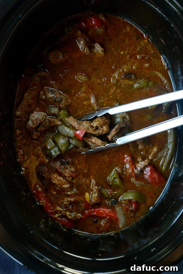Saucy steak fajita filling cooked to perfection in the slow cooker