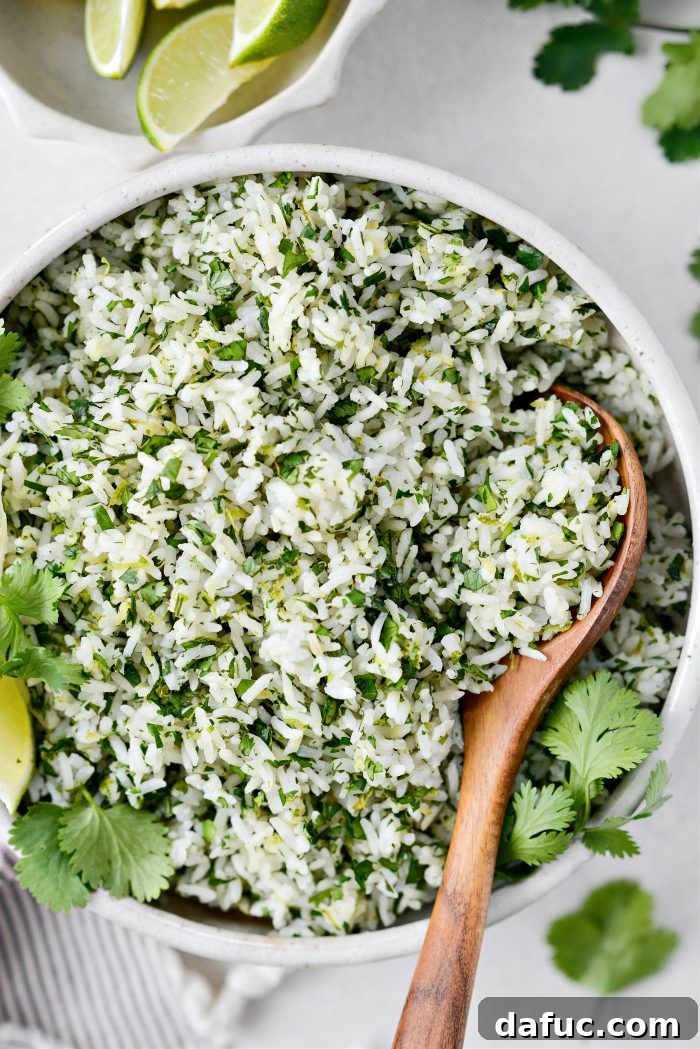 Cilantro Lime Rice garnished with a lime slice and cilantro sprig, close-up