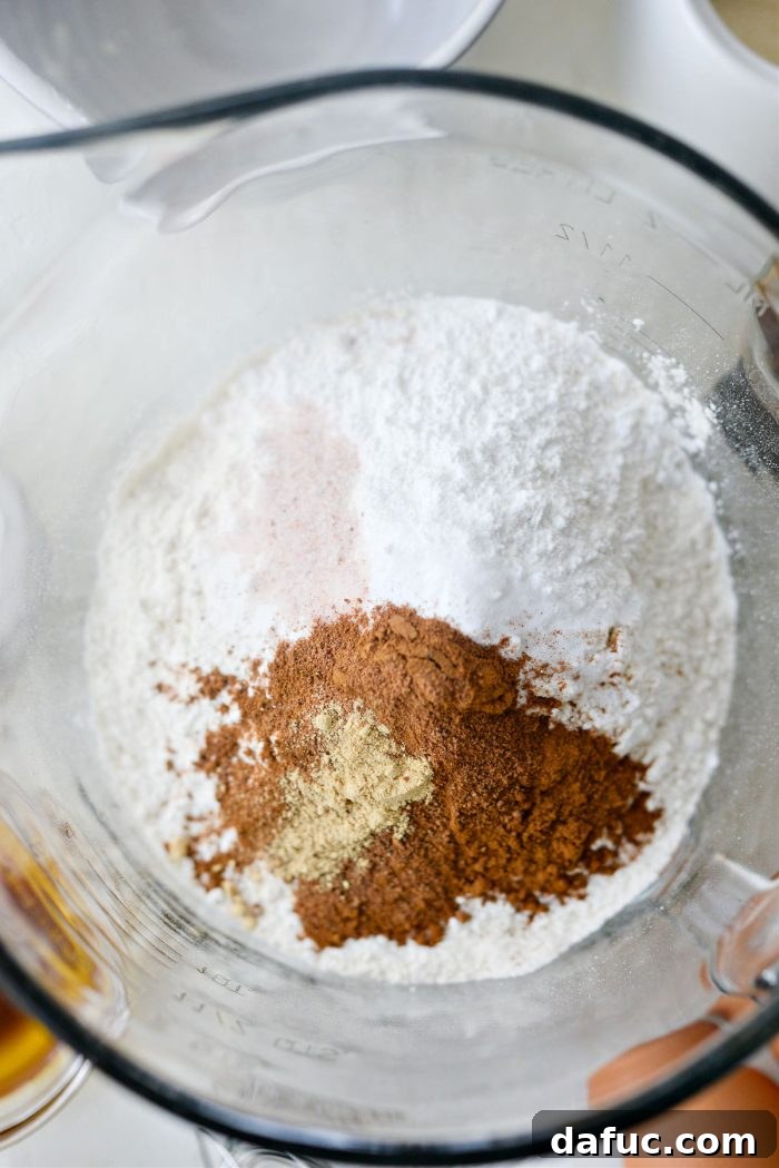 Spiced Brown Butter Pumpkin Pancakes 6 A large mixing bowl containing all the dry ingredients for the pancakes, perfectly measured and ready for whisking.