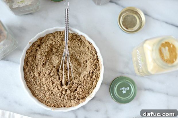 Spice Up Your Kitchen: 20+ Homemade Blends 5 Cinnamon Sugar mix in a small bowl with a spoon