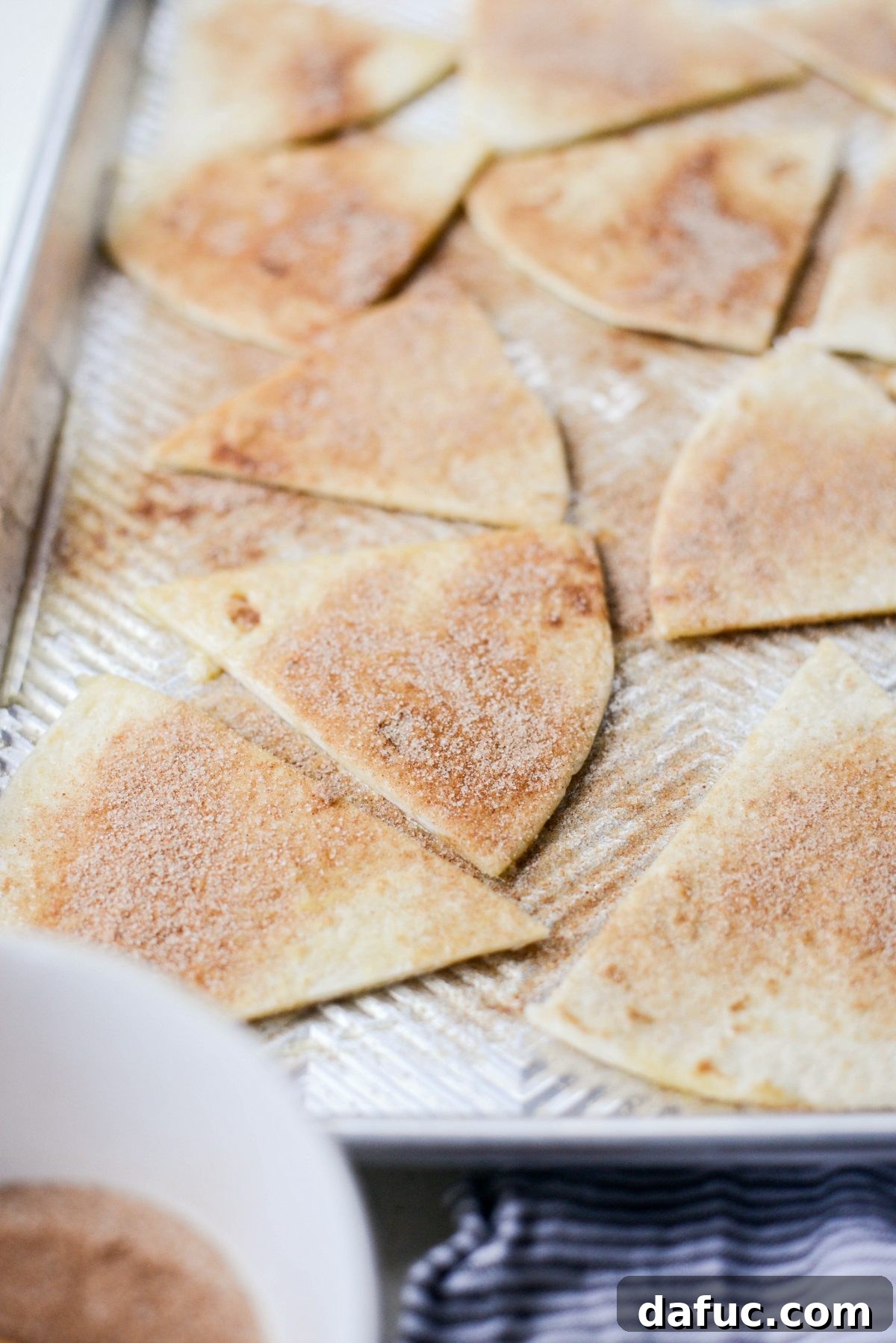 sprinkle buttered tortillas with cinnamon sugar