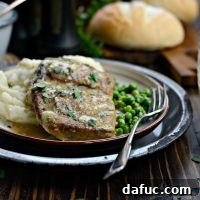 Slow Cooker Pork Chops with Herb Gravy recipe card image