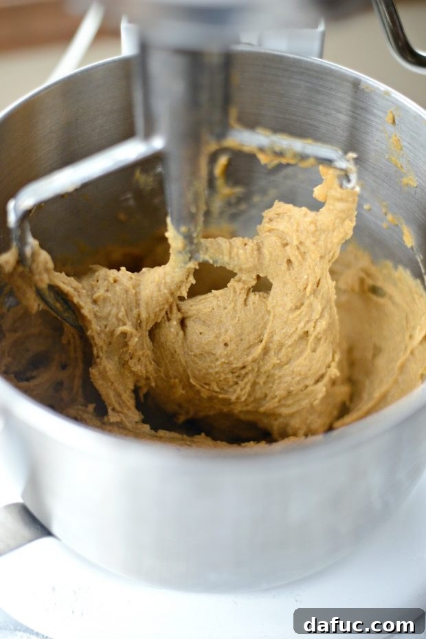Smooth and ready pumpkin coffee cake batter in a mixing bowl