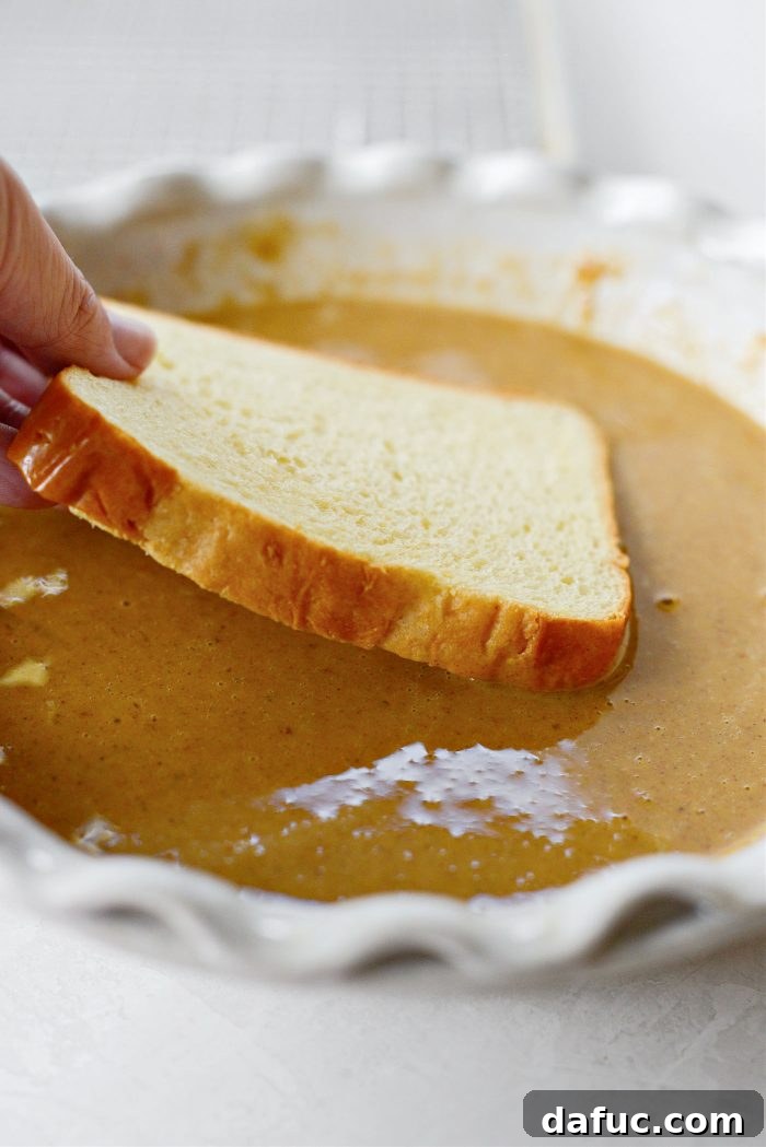 dip bread into pumpkin custard
