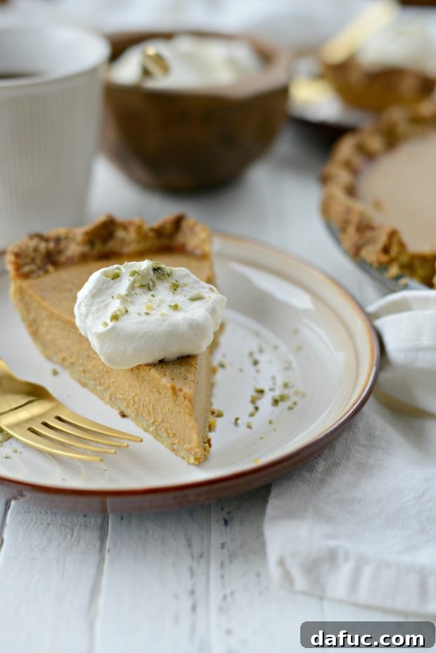 Exotic Chai Pumpkin Pie 2 Chai Pumpkin Pie with whipped cream and crushed pepitas