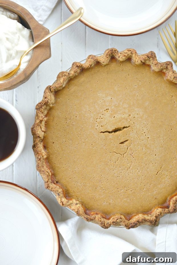 Exotic Chai Pumpkin Pie 9 Close-up of a slice of Chai Pumpkin Pie, ready to serve