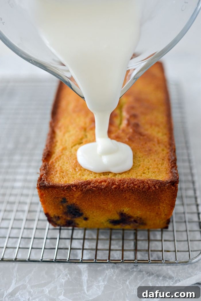 Sunshine Berry Bliss 21 pour icing overtop of cooled cake