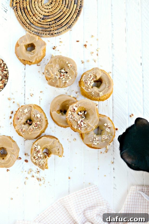 Baked Pumpkin Doughnuts with Brown Sugar Maple Glaze l SimplyScratch.com