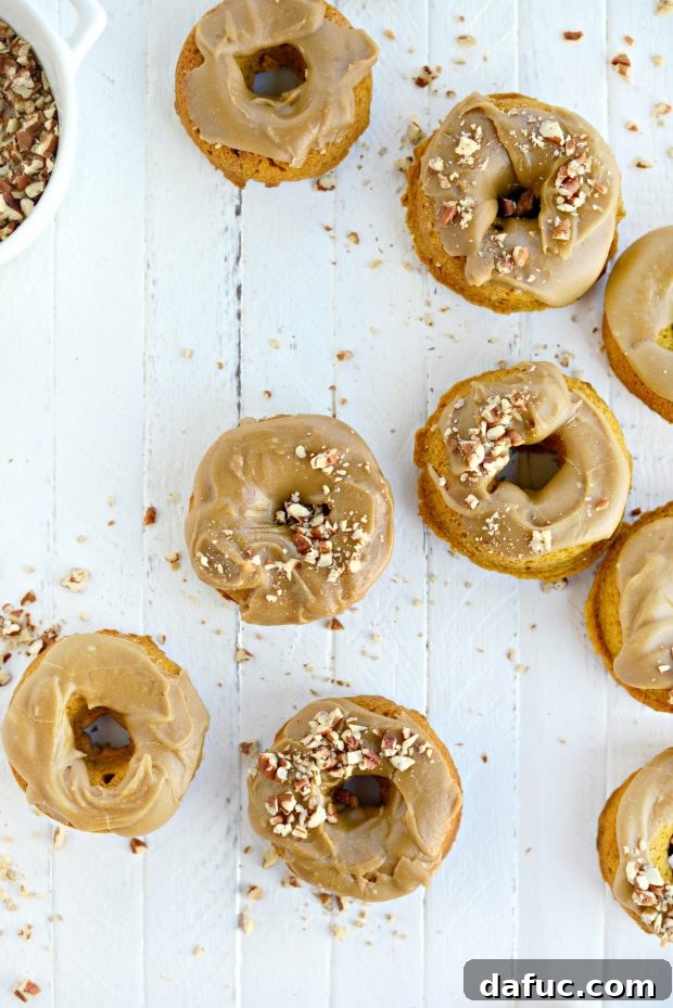 Close-up of fluffy baked pumpkin doughnuts stacked high