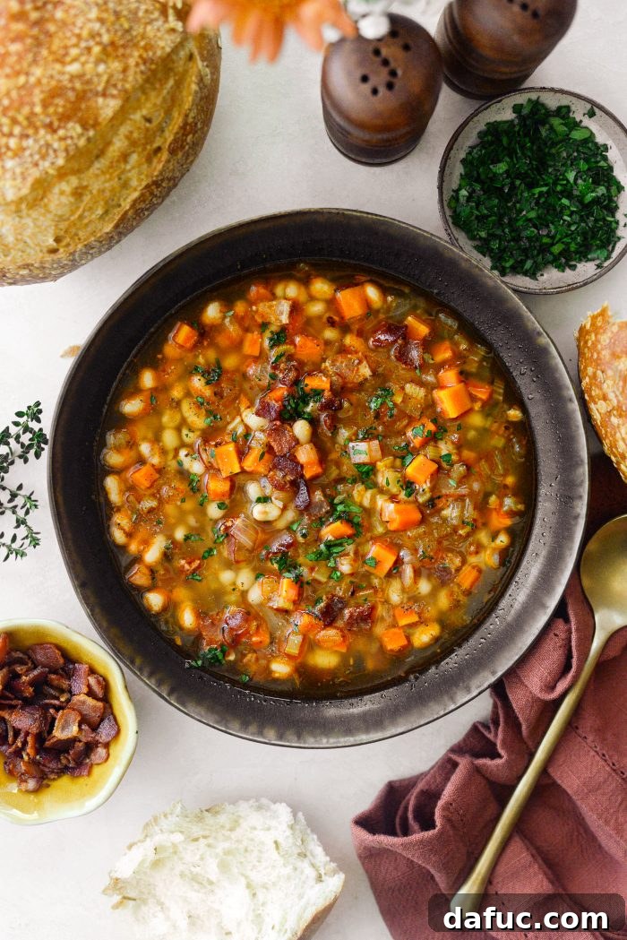 Smoky Bean and Bacon Delight 21 A warm bowl of freshly made Bean and Bacon Soup, ready for its final garnishes.