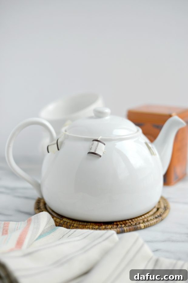 Spiced Comfort Masala Chai 12 A teapot with tea bags inside, ready for boiling water for Masala Chai