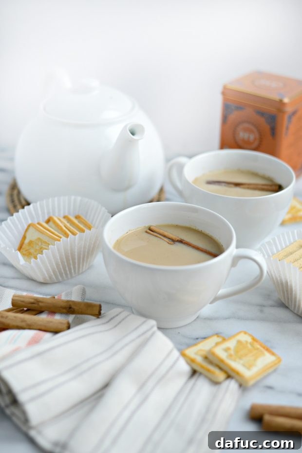 Spiced Comfort Masala Chai 3 Ingredients for Masala Chai laid out, including black tea bags, honey, and spices