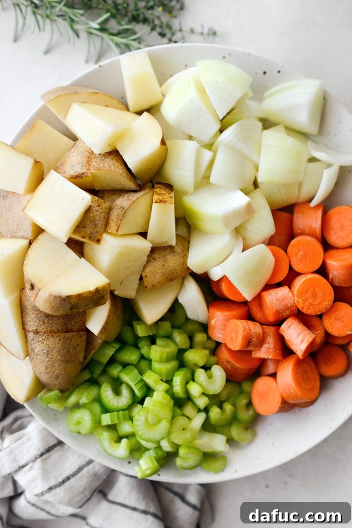 Plate of chopped root vegetables for the stew