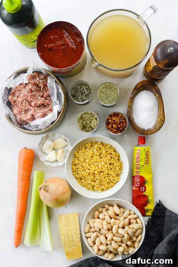 Assortment of fresh ingredients for Italian Sausage White Bean Soup laid out