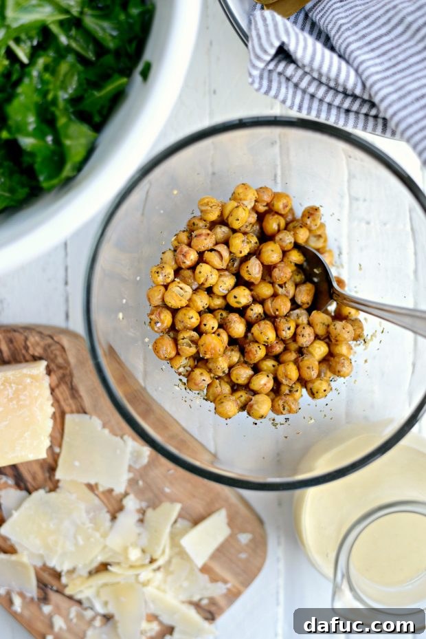 Assortment of fresh ingredients for the Healthy Kale Caesar Salad, including kale, tahini, lemon, and chickpeas.