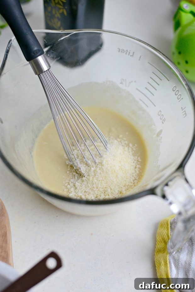 Creamy Tahini Kale Caesar Salad 6 Roasted Garlic Herb Chickpeas on a baking sheet