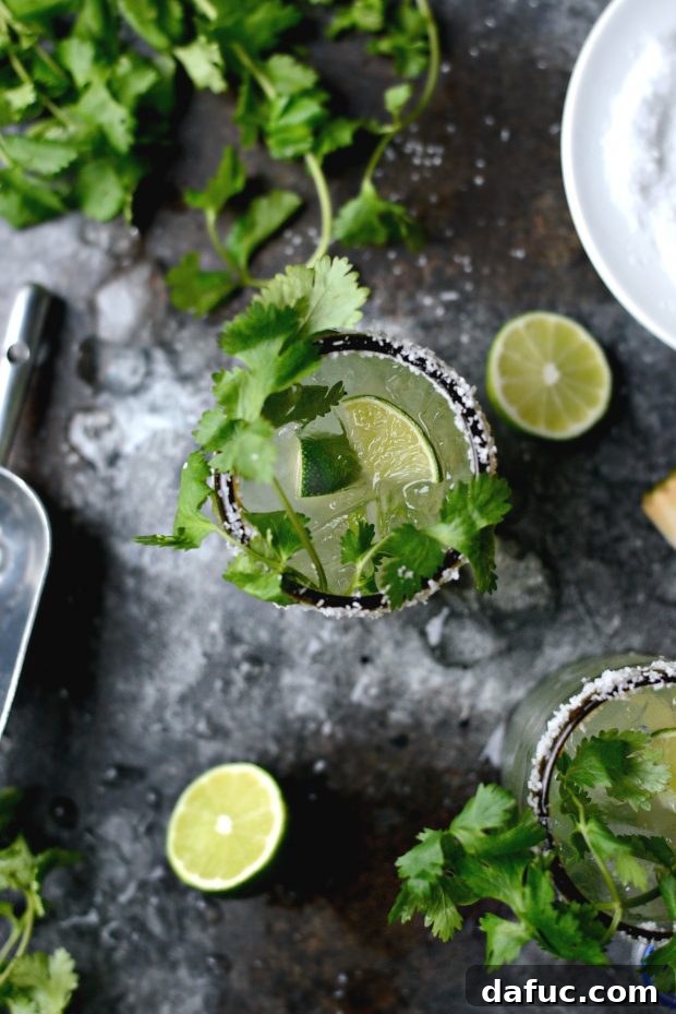 Zesty Cilantro Lime Margaritas 13 Final shot of two Cilantro Lime Margaritas on a tray