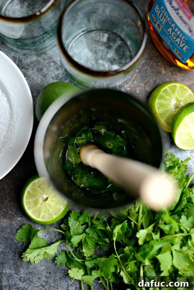 Zesty Cilantro Lime Margaritas 7 Freshly squeezed lime juice in a measuring cup
