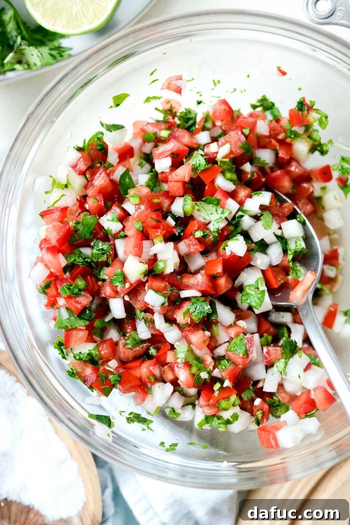 A serving of quick pico de gallo, a vibrant topping for the Ancho Chorizo Chili.