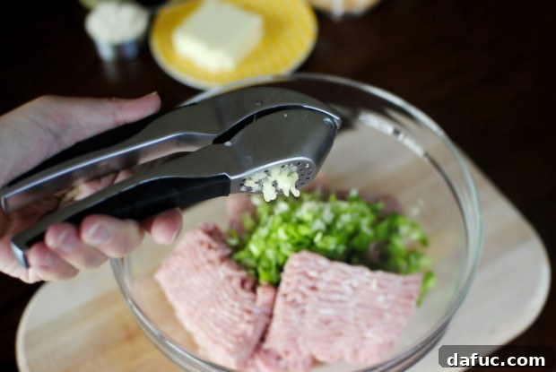 press da garlic Pressing garlic for turkey burgers