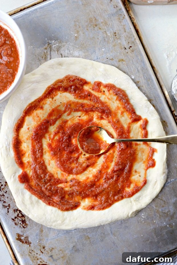 Pure Margherita Perfection 7 spread with sauce