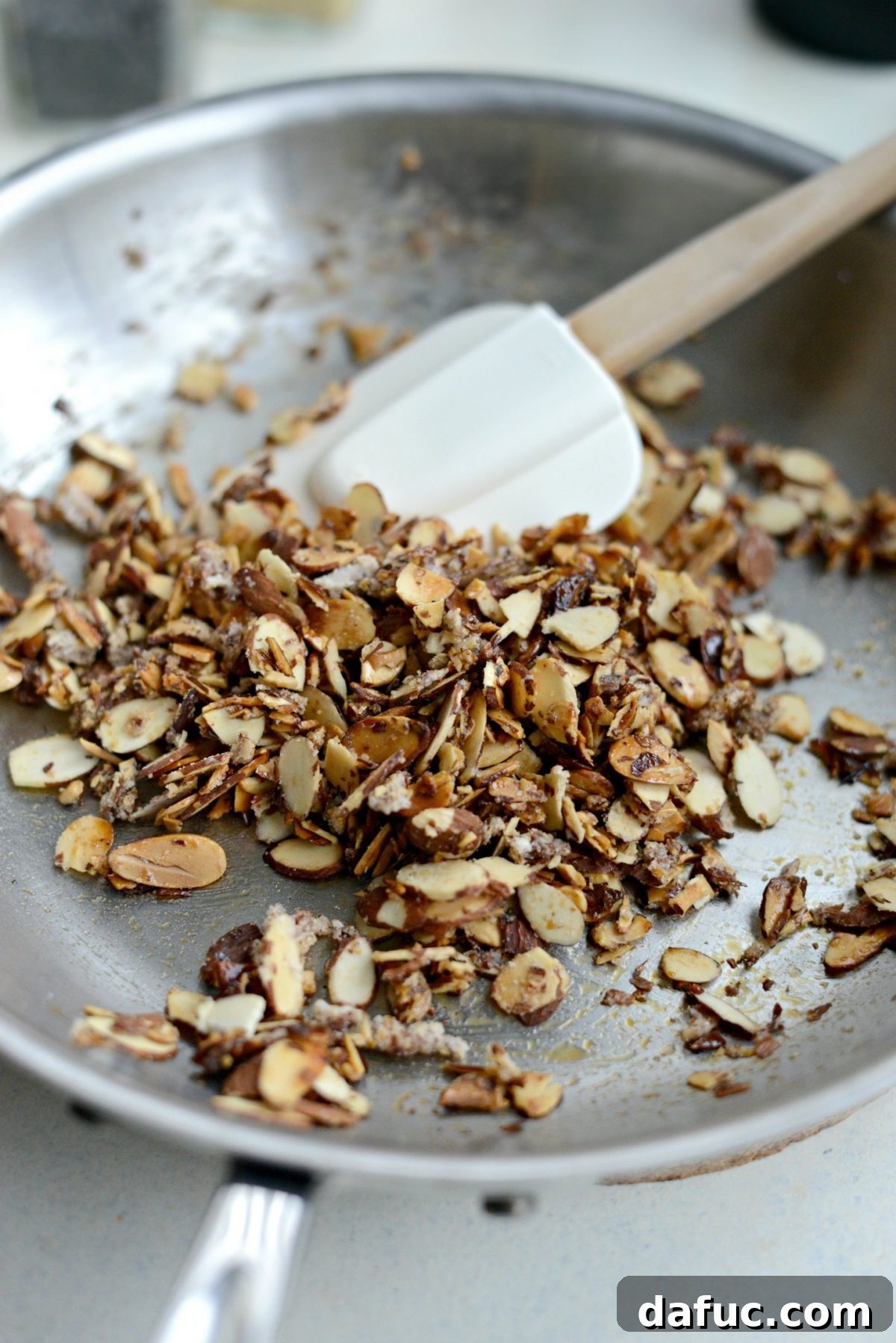 Golden Citrus Poppy Seed Salad 5 toasted candied almonds.
