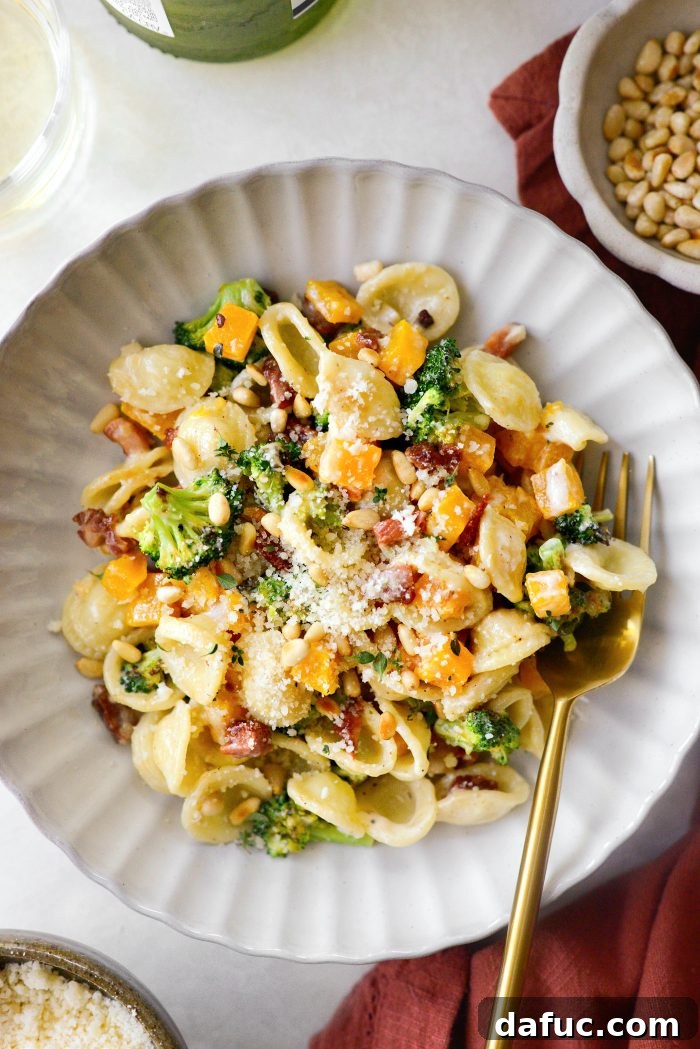 Autumn Orecchiette with Pancetta, Butternut Squash, and Broccoli 2 Orecchiette Pasta with Roasted Butternut Squash and Broccoli, garnished with pine nuts and Parmesan