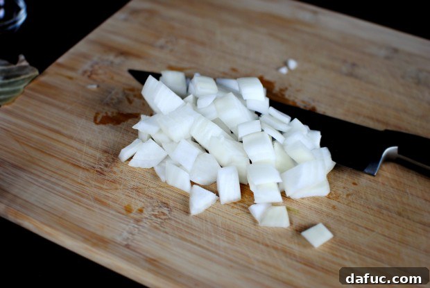 Garlic clove placed inside a food processor