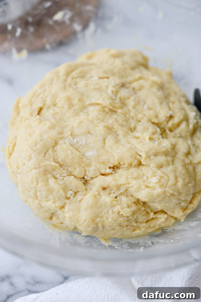 Irresistibly Easy Homemade Rolls 14 Dough formed into a ball, covered, and ready for refrigeration