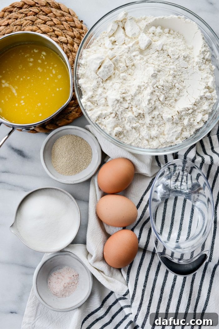 Irresistibly Easy Homemade Rolls 4 Ingredients for Easy Homemade Dinner Rolls laid out on a table