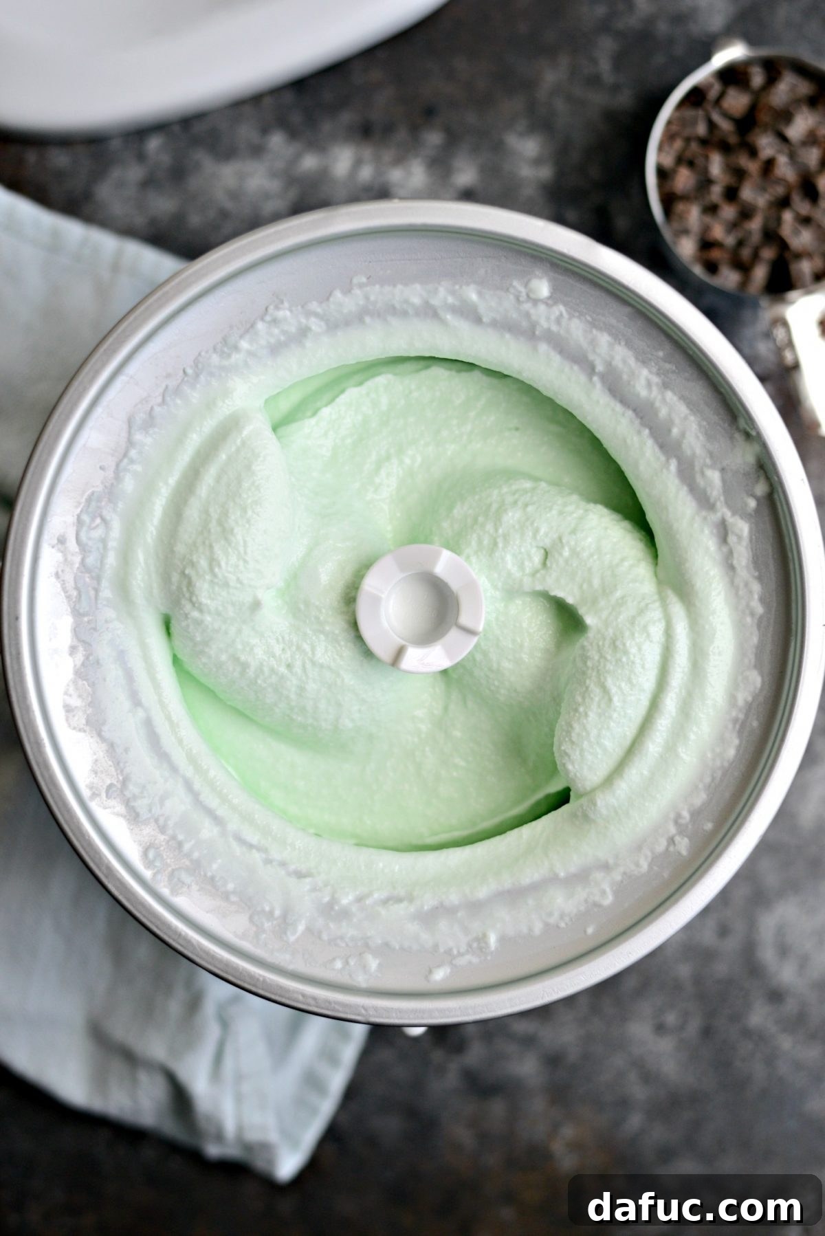 Churning ice cream until thick and creamy
