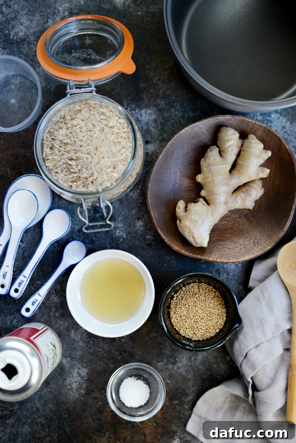 Toasted Sesame Ginger Brown Rice 4 Ingredients for Ginger Sesame Brown Rice including brown rice, fresh ginger root, sesame oil, and sesame seeds
