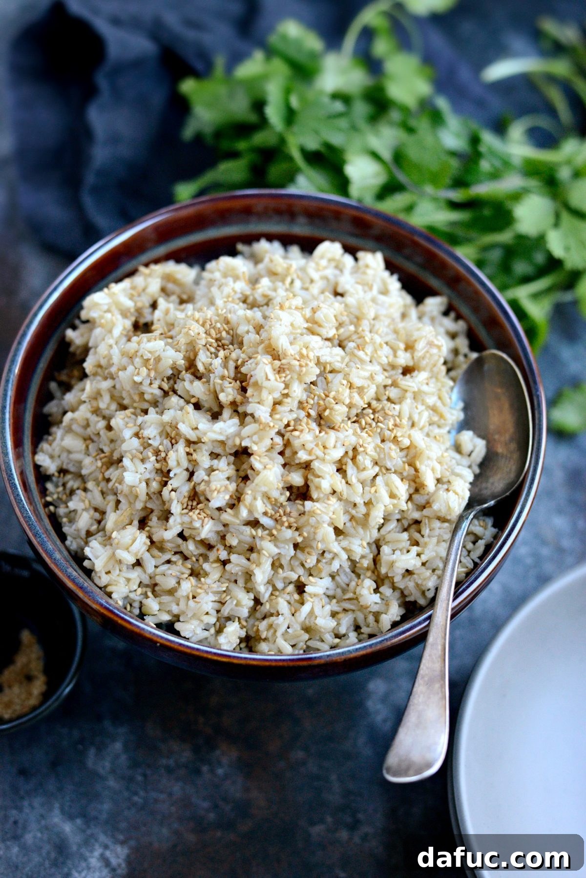 Toasted Sesame Ginger Brown Rice 10 Beautifully presented Ginger Sesame Brown Rice in a bowl, showcasing its appeal