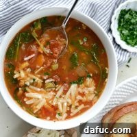 Close-up of Tomato Florentine Soup with garnishes