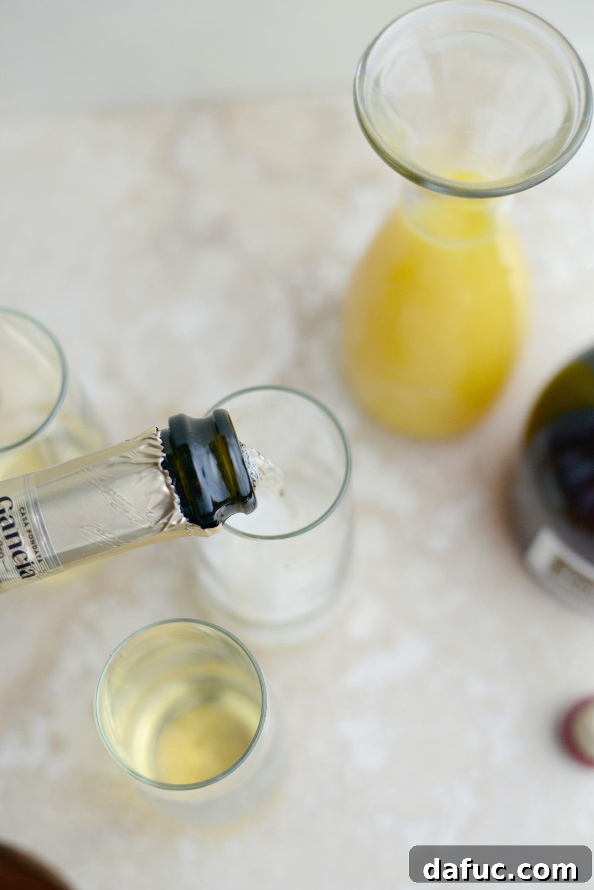 Mimosa Magic 6 pouring champagne