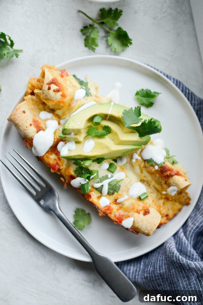 Closeup of Lighter Chicken Enchiladas with rich, creamy chipotle sauce