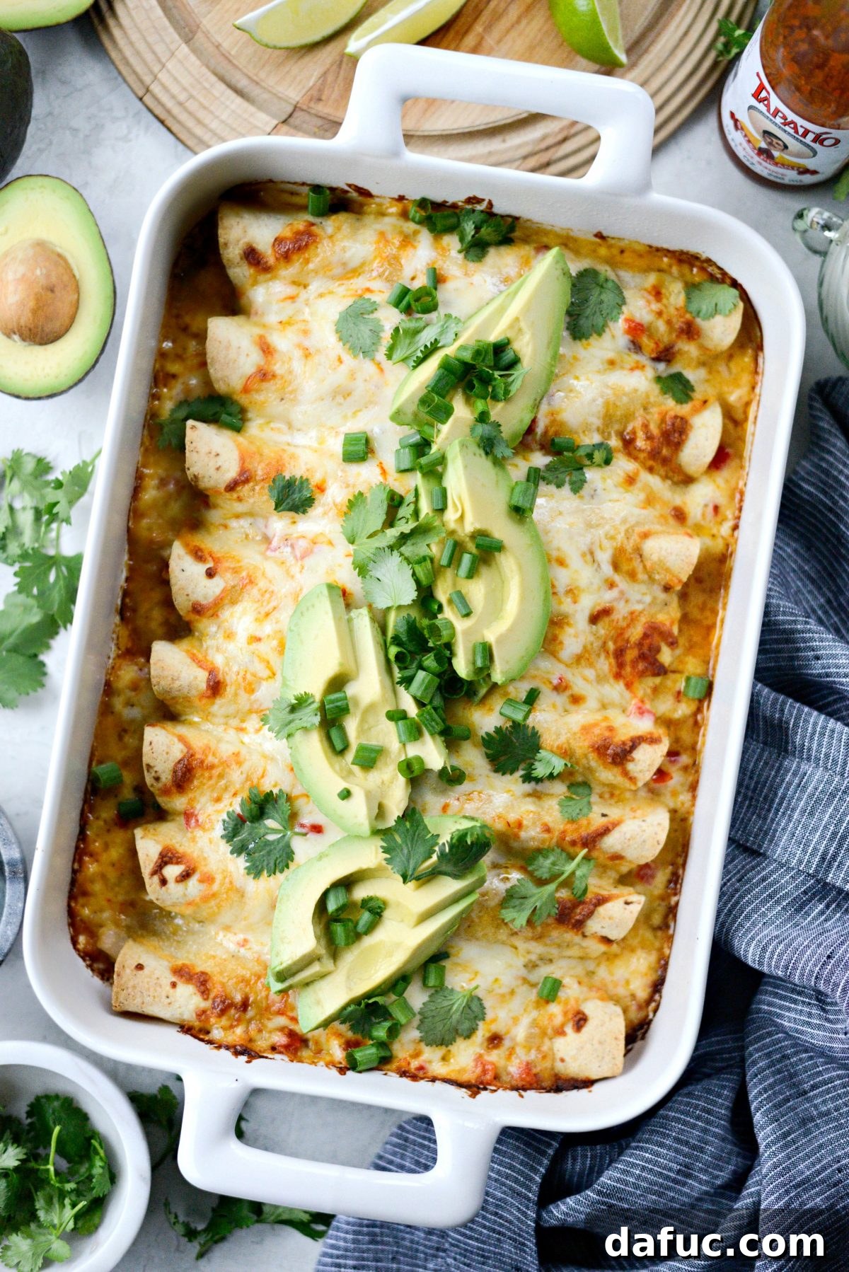 Freshly baked Lighter Chicken Enchiladas, golden and bubbly from the oven