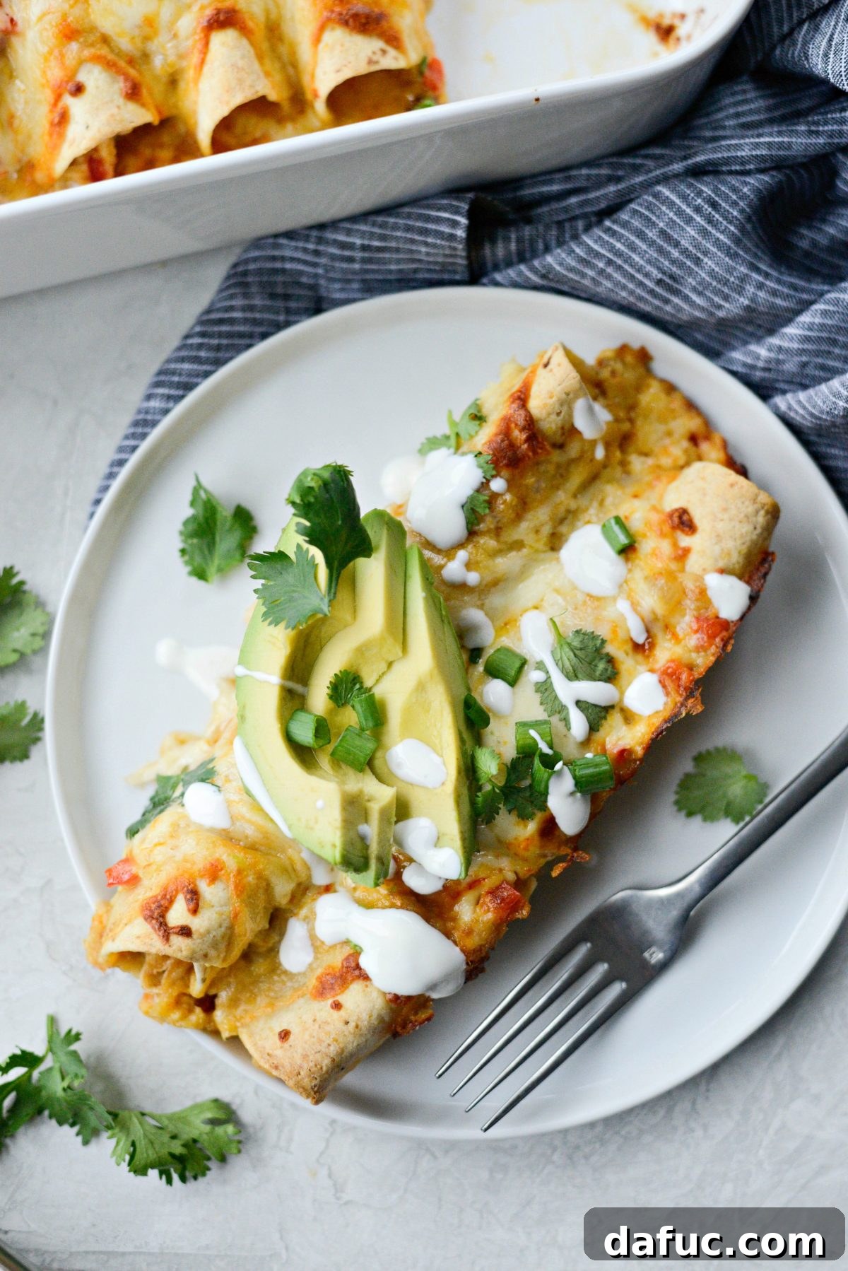 Lighter Chicken Enchiladas baked to perfection and ready to be served