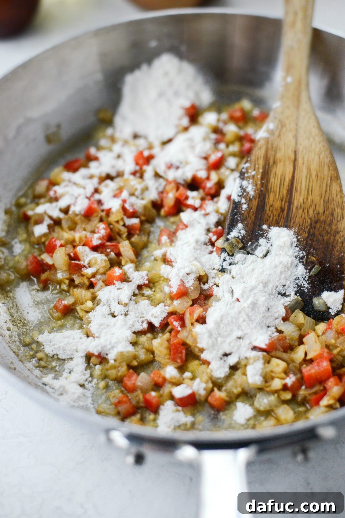 Adding butter and flour to create a roux for the creamy chipotle sauce
