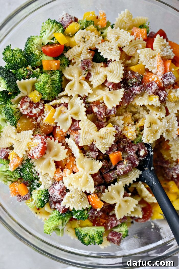 Mediterranean Bowtie Delight 12 Toss pasta salad with dressing