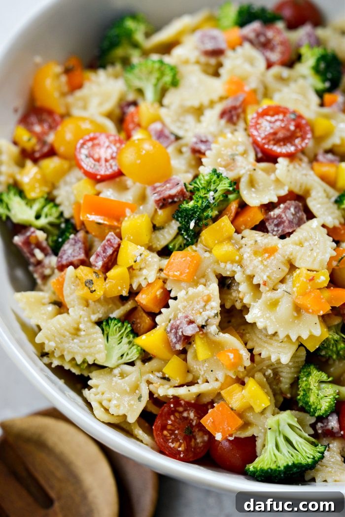 Mediterranean Bowtie Delight 3 Close-up of Italian Bowtie Pasta Salad in a bowl