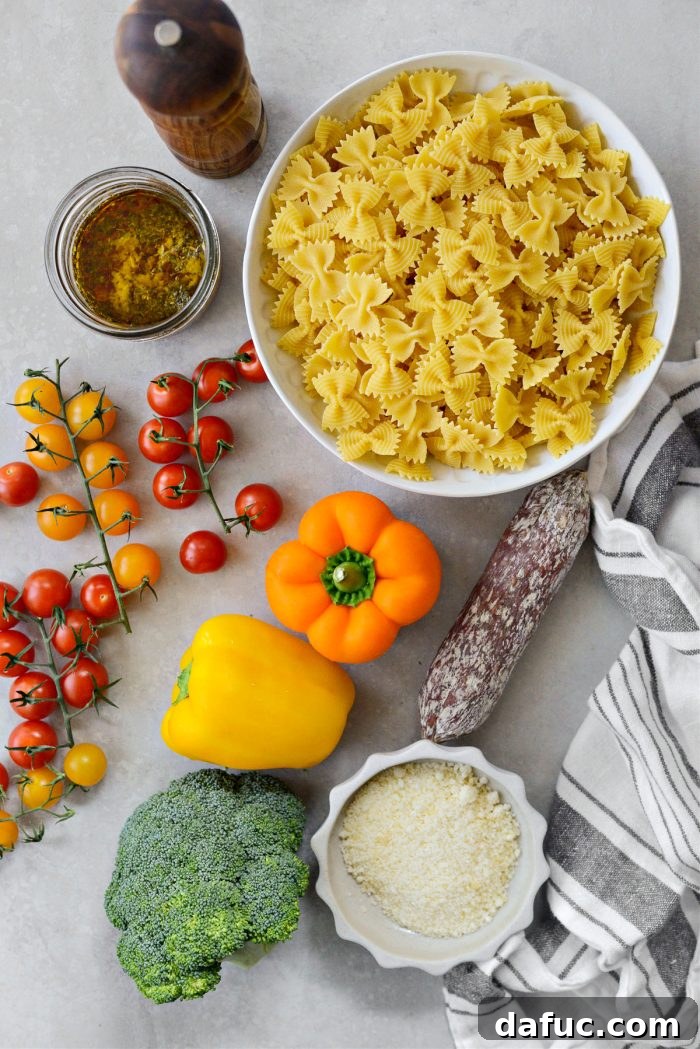 Mediterranean Bowtie Delight 4 Ingredients for Italian Bowtie Pasta Salad on a counter