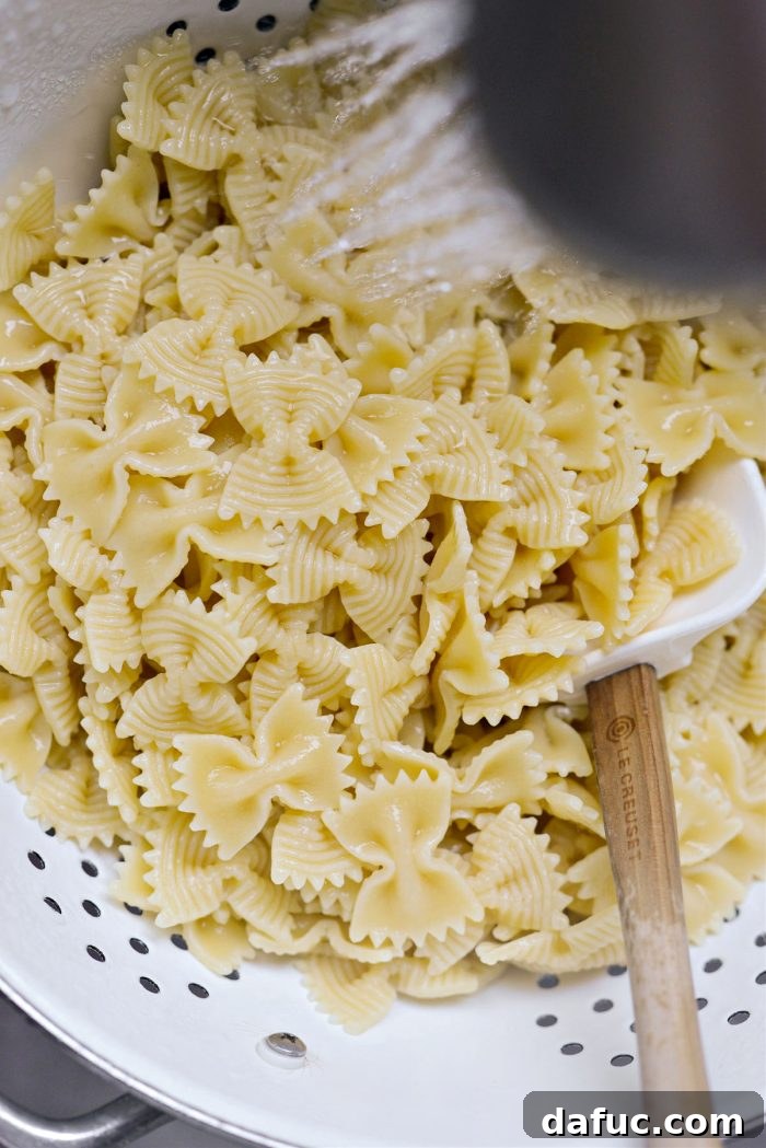 Mediterranean Bowtie Delight 9 Drain and rinse pasta in colander