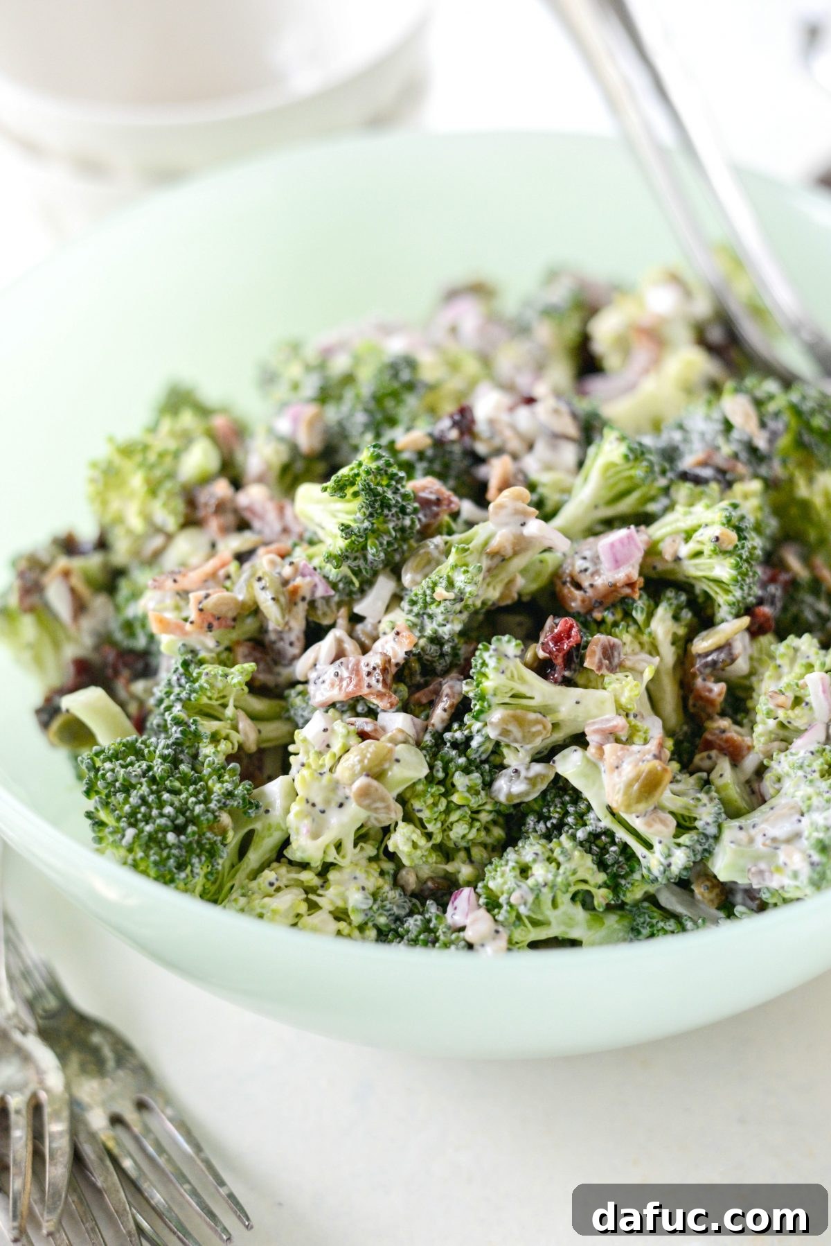 Broccoli Crunch Salad, a popular classic with cranberries, bacon, and sunflower seeds.