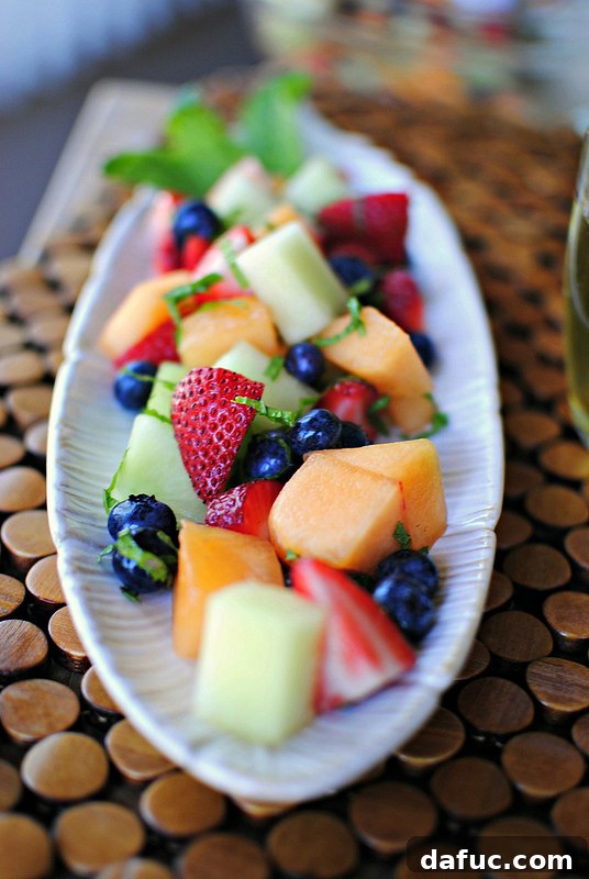 White Wine Drenched Fruit Salad, an adult-friendly boozy fruit salad for parties.